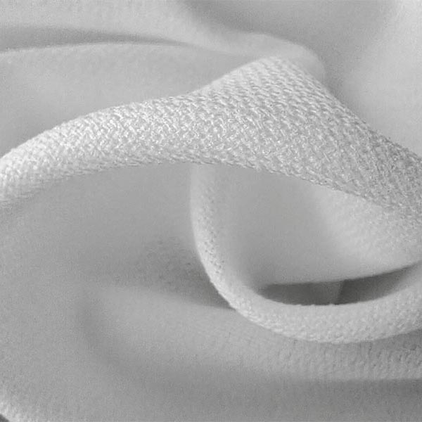 Stiff water jet woven interlining